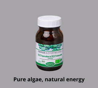 Vitamin supplement bottle with label on a gray background