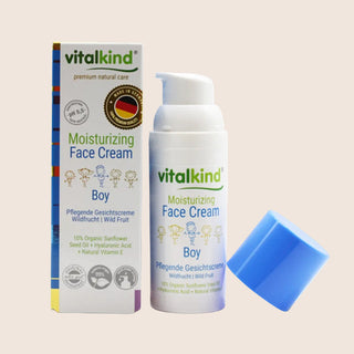 Vitalkind moisturizing face cream for boys with packaging on a beige background