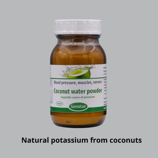 Bottle of coconut water powder with a label on a gray background