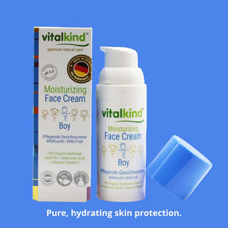 Vitalkind moisturizing face cream for boys on a blue background
