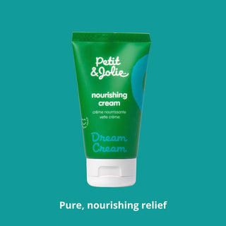 Green tube of Petit Jolie nourishing cream on a teal background