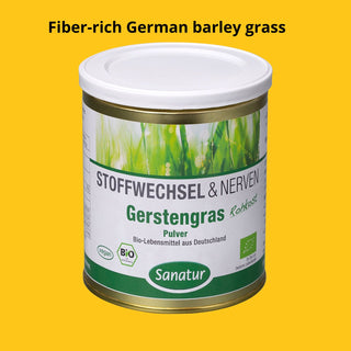 Canister of fiber-rich German barley grass powder with 'Sanatur' branding on a yellow background