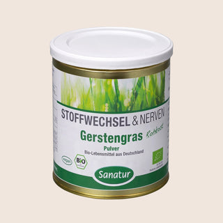 Canister of Sanatur Gerstengras Pulver on a beige background
