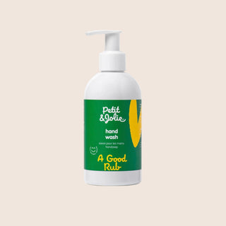Petit & Jolie hand wash bottle on a beige background