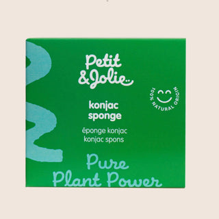 Green packaging of Petit & Jolie konjac sponge with branding and product name.
